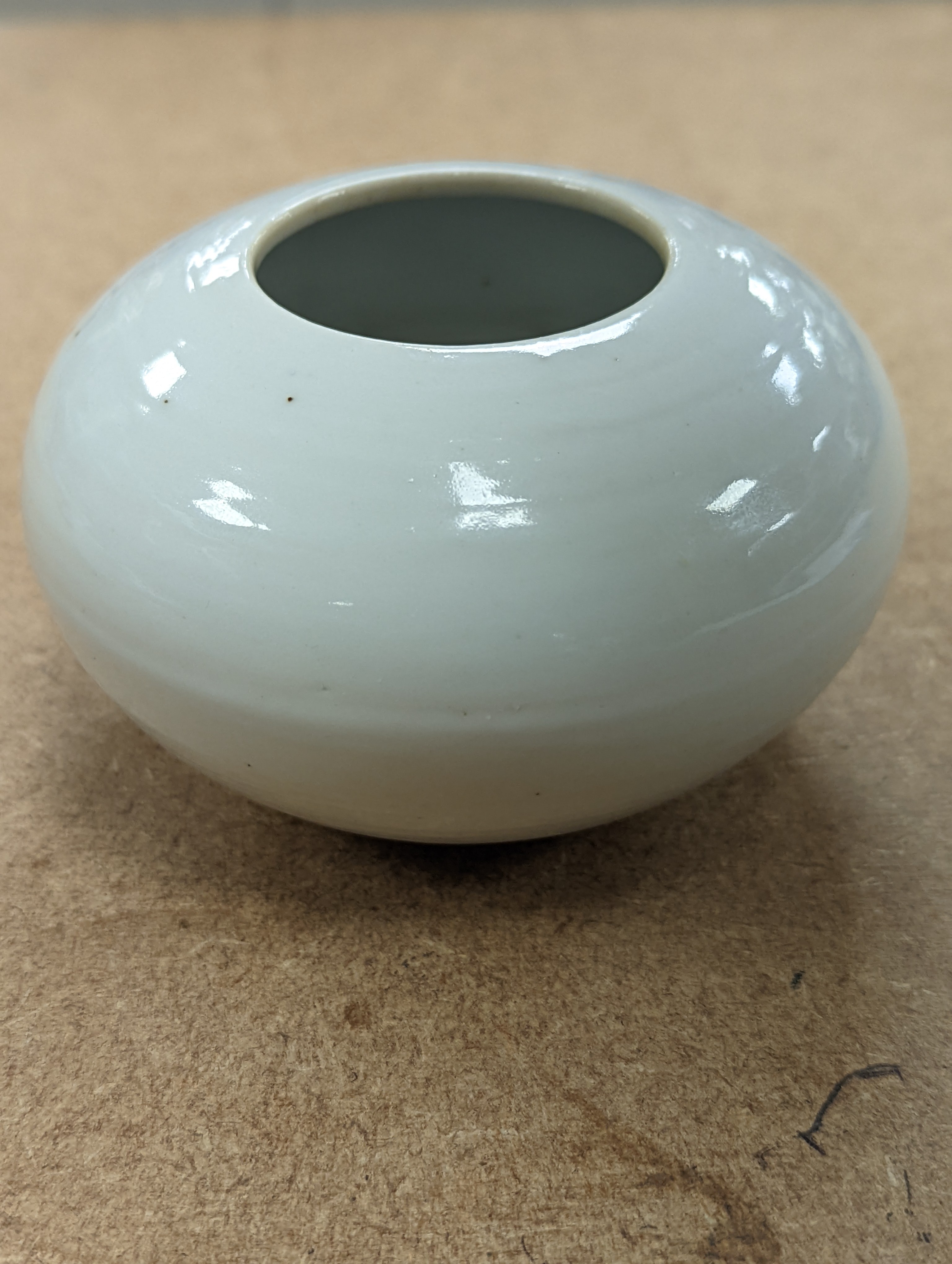 A Chinese white glazed water pot and a similar cup (2)